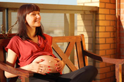 Pregnant Woman under the sun