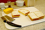 preparing cheese sandwich