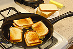 toast sandwiches on skillet