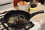 heating oil in a skillet