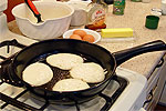 cooking pancakes on skillet