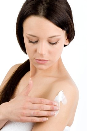 Woman applying Organic Body Butter