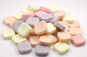 pile of antacid tablets