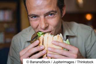 Man Eating a Hamburger
