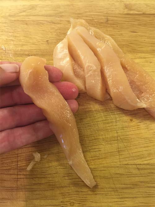 slice chicken breasts into strips
